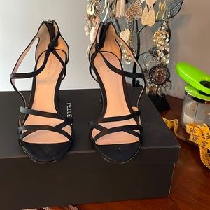 Pelle Moda black silk, like new, worn once.
